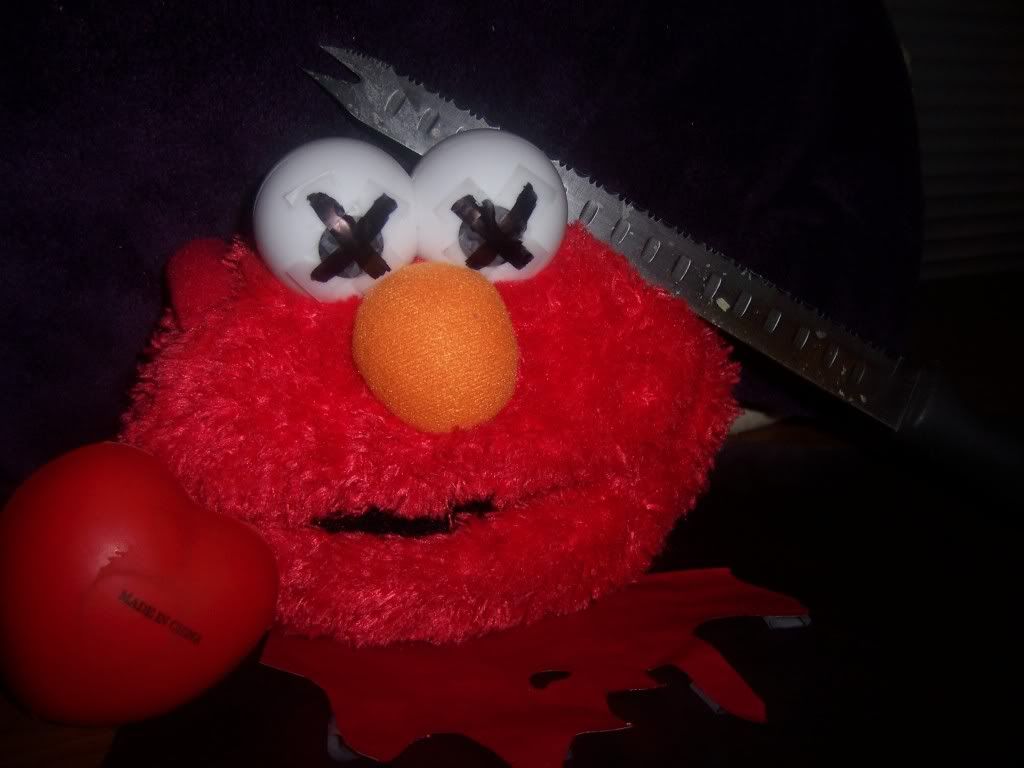 dead elmo doll